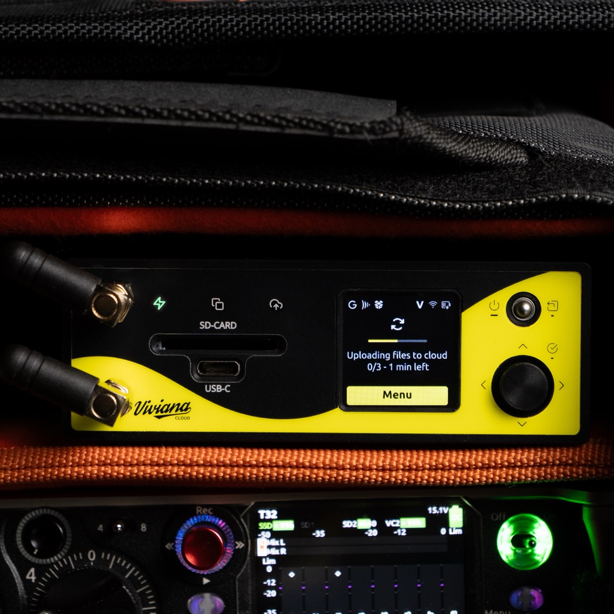 Viviana Cloud device uploading files to the cloud, mounted in a sound bag above a Sound Devices recorder